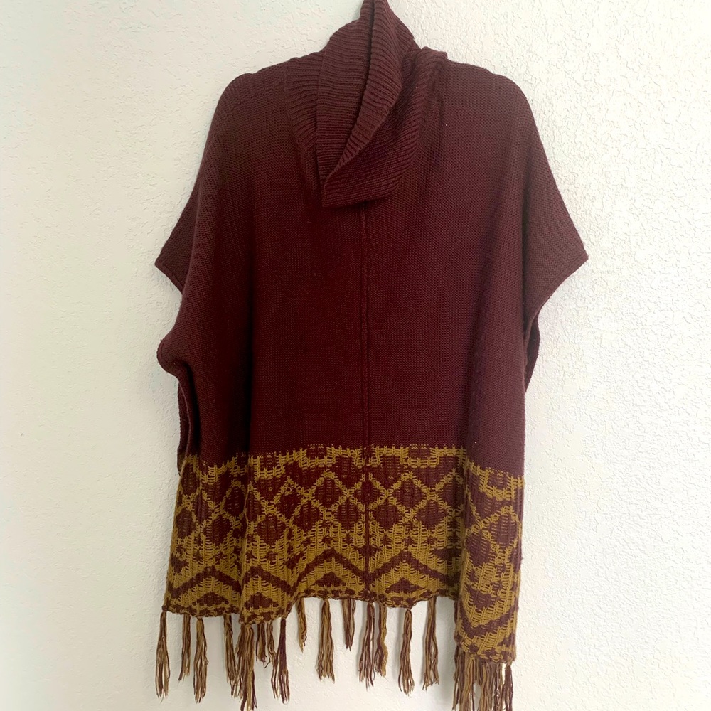 Fringed cowl neck poncho